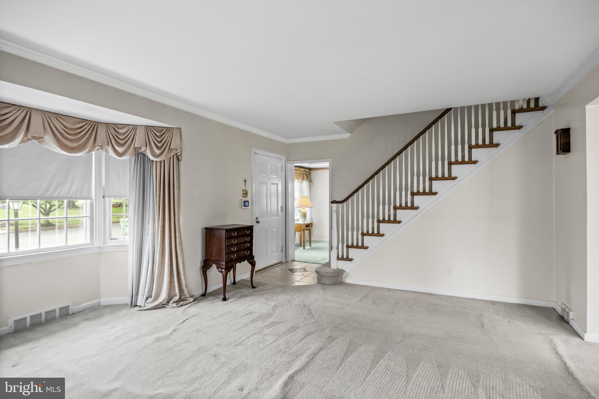 7 Colwick Road Cherry Hill, NJ 08002 - Photo 6 of 37 a view of a livingroom with an entryway and fireplace