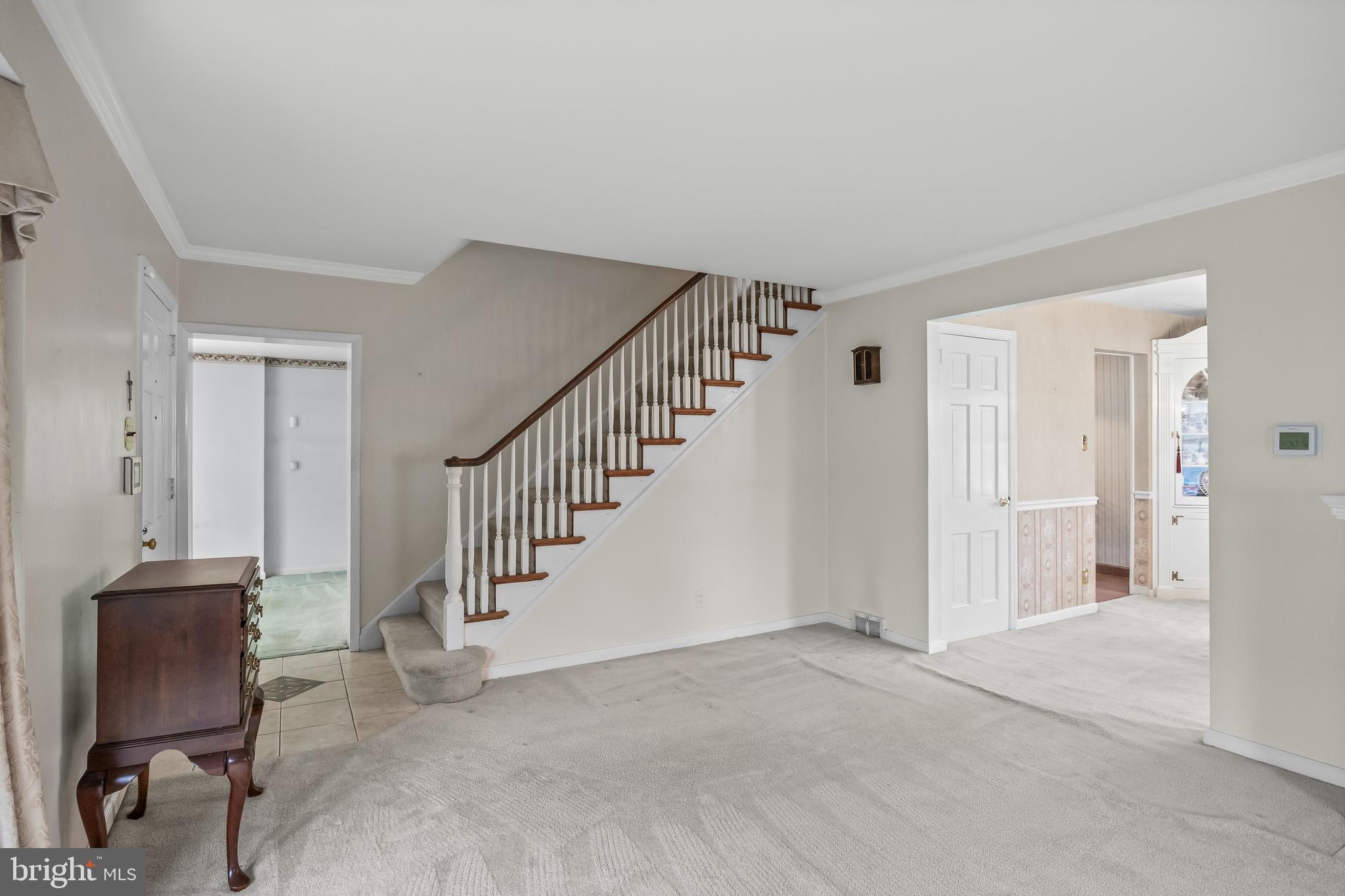 7 Colwick Road Cherry Hill, NJ 08002 - Photo 7 of 37 a view of an entryway with wooden floor and a cabinet