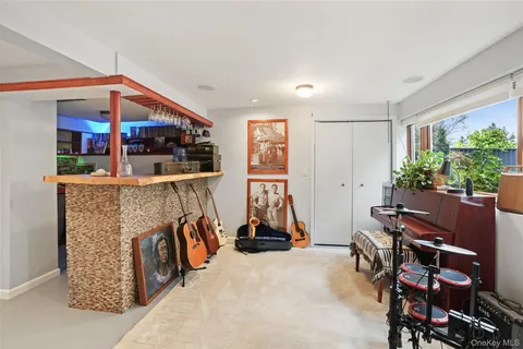 a room with furniture and gym equipment