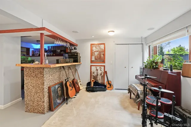 a room with furniture and gym equipment