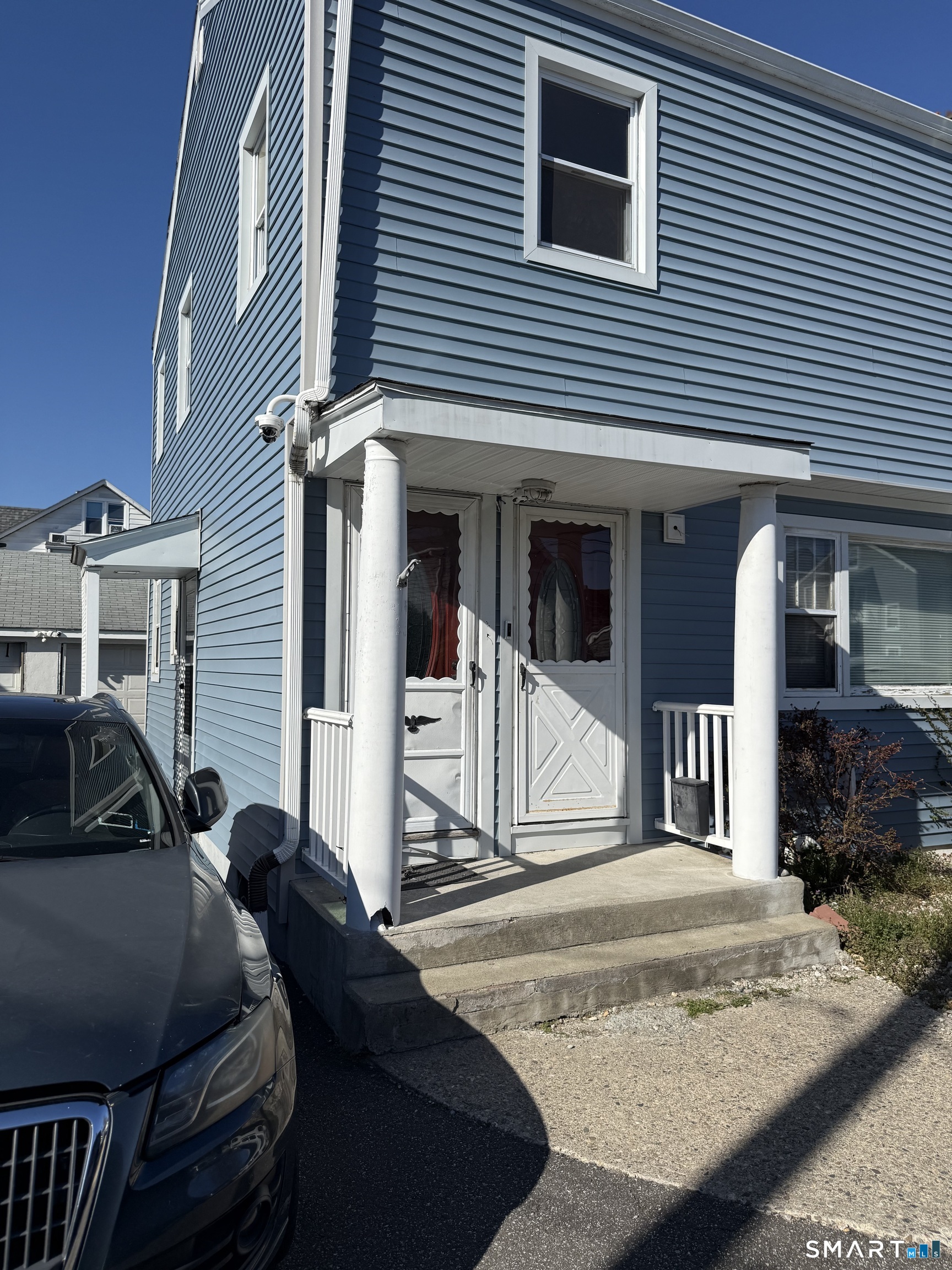 a view of a house with a patio