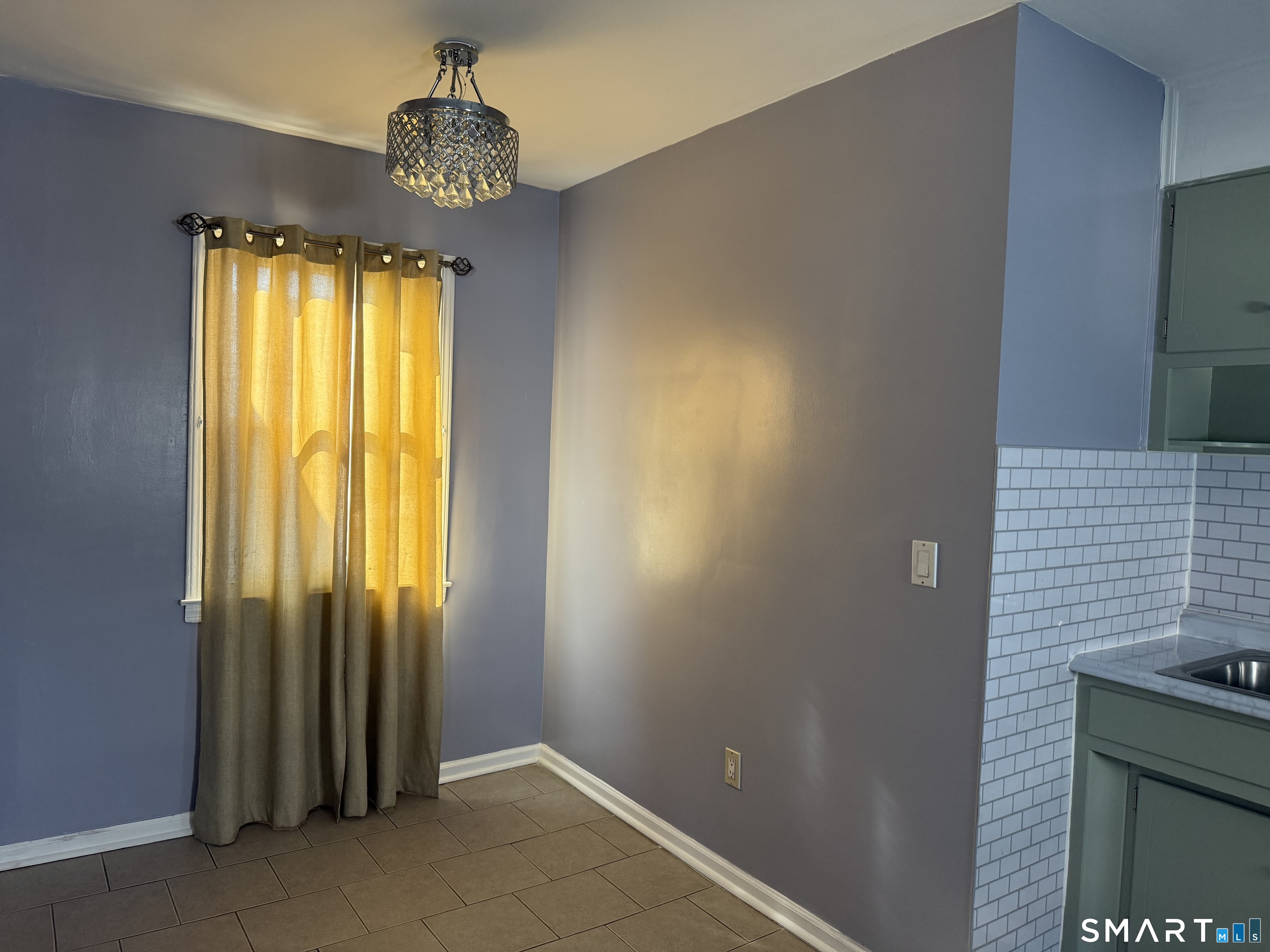 95-97 Locust Street Bridgeport, CT 06610 - Photo 6 of 16 a view of entryway with chandelier