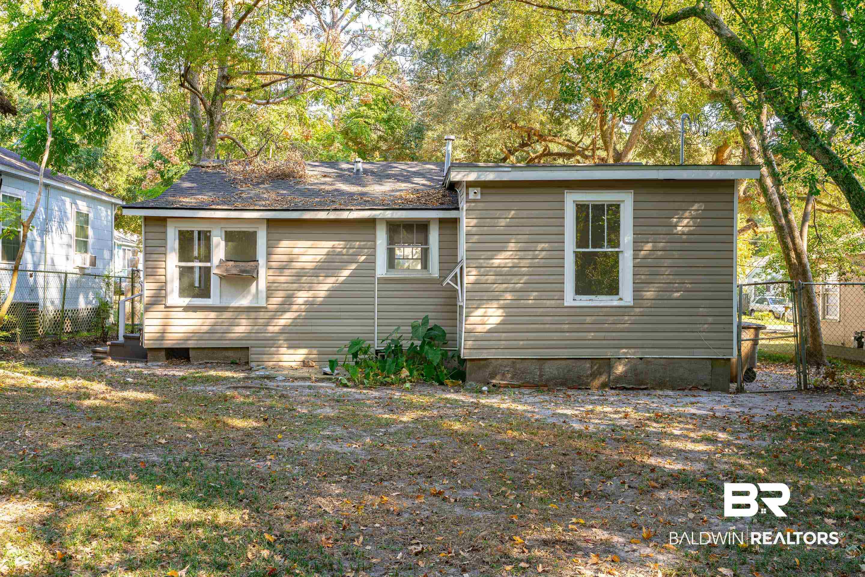 166 Crenshaw Street Mobile, AL 36606 - Photo 21 of 24 View of rear view of house