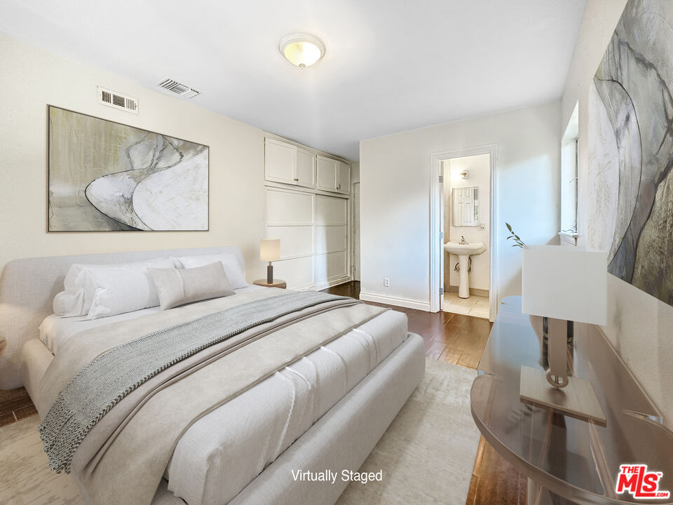 2944 Ronald Street Riverside, CA 92506 - Photo 13 of 37 a bedroom with a bed and window