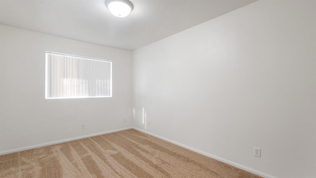 1428 Realty Road Ramona, CA 92065 - Photo 11 of 18 a view of an empty room with a window