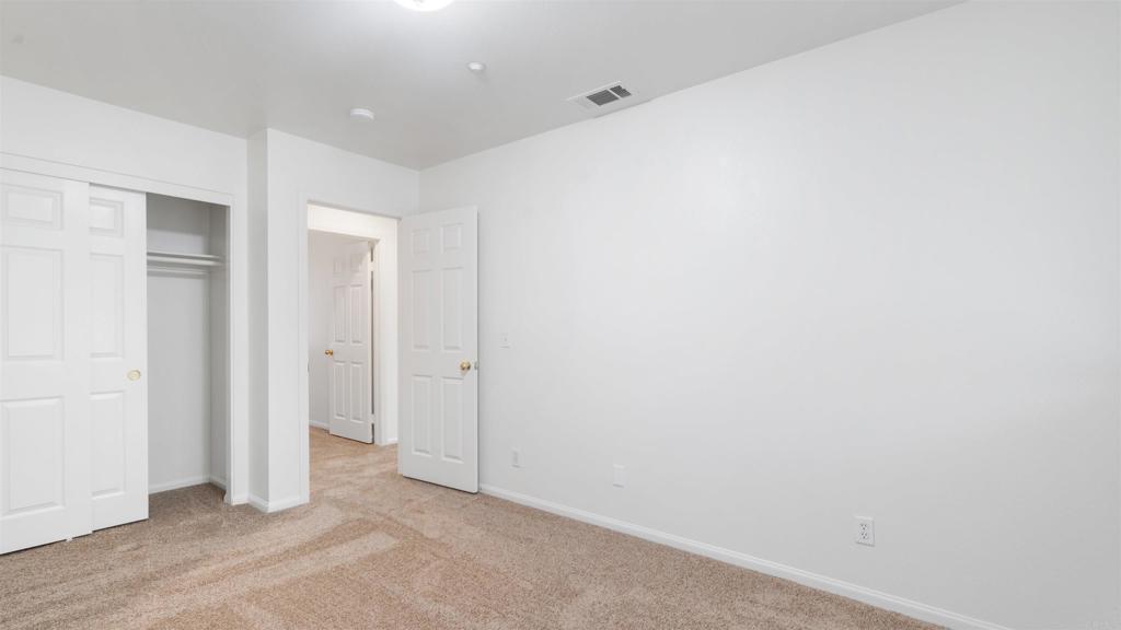 1428 Realty Road Ramona, CA 92065 - Photo 12 of 18 an empty room with closet area