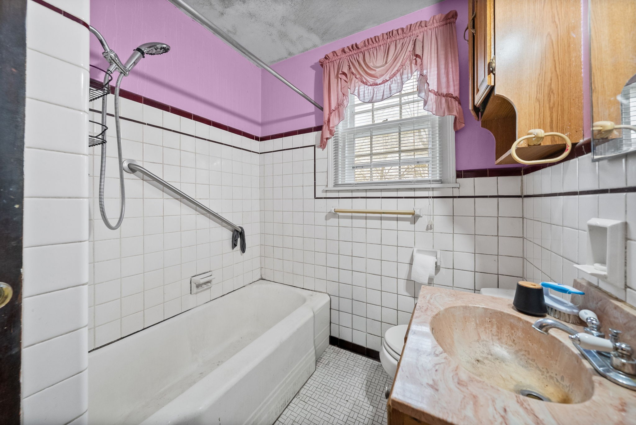 210 Cliffdale Road Nashville, TN 37214 - Photo 17 of 38 a bathroom with a sink and bathtub with shower