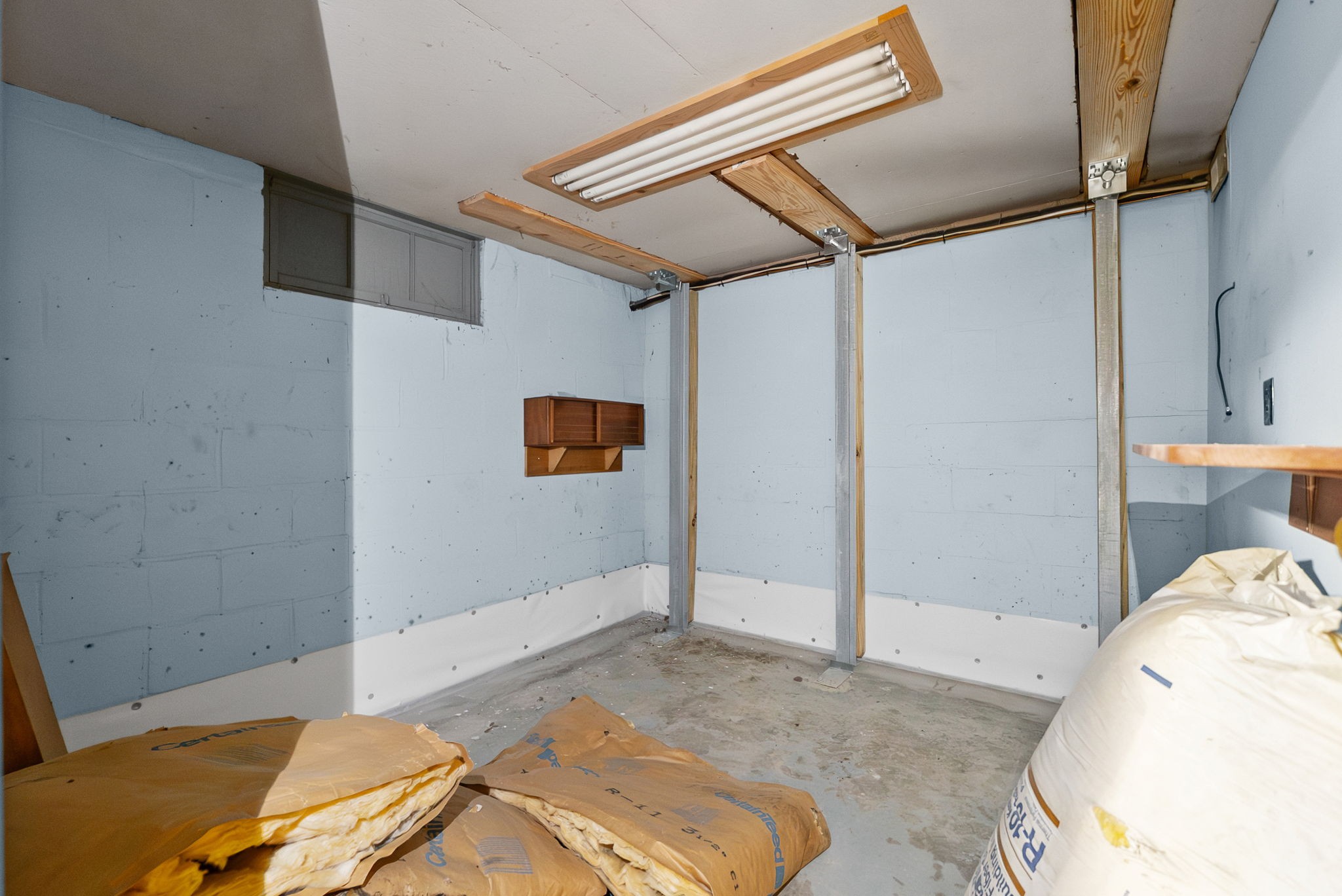 210 Cliffdale Road Nashville, TN 37214 - Photo 27 of 38 a bedroom with a bed and wooden floor