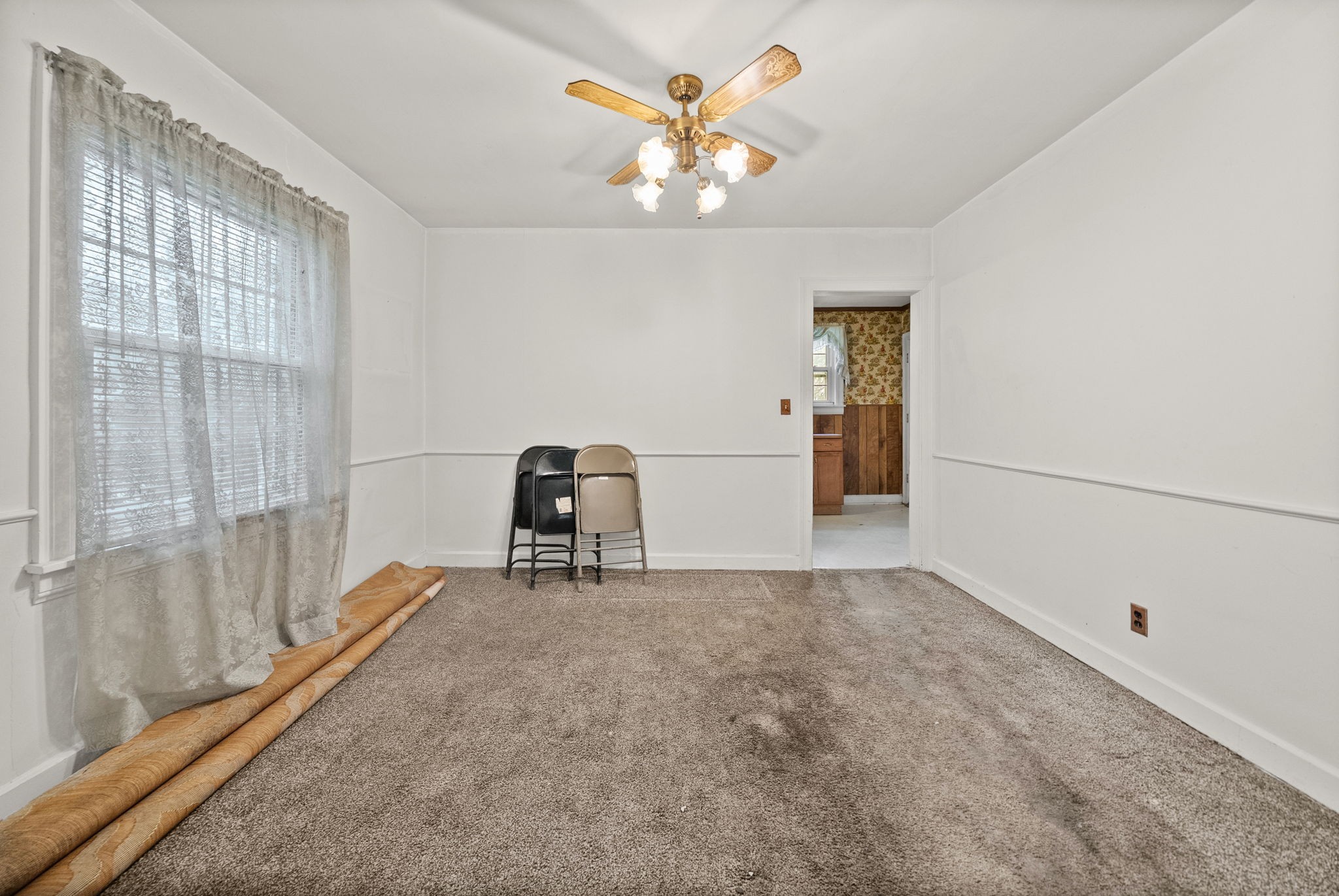 210 Cliffdale Road Nashville, TN 37214 - Photo 9 of 38 a living room with furniture and a chandelier
