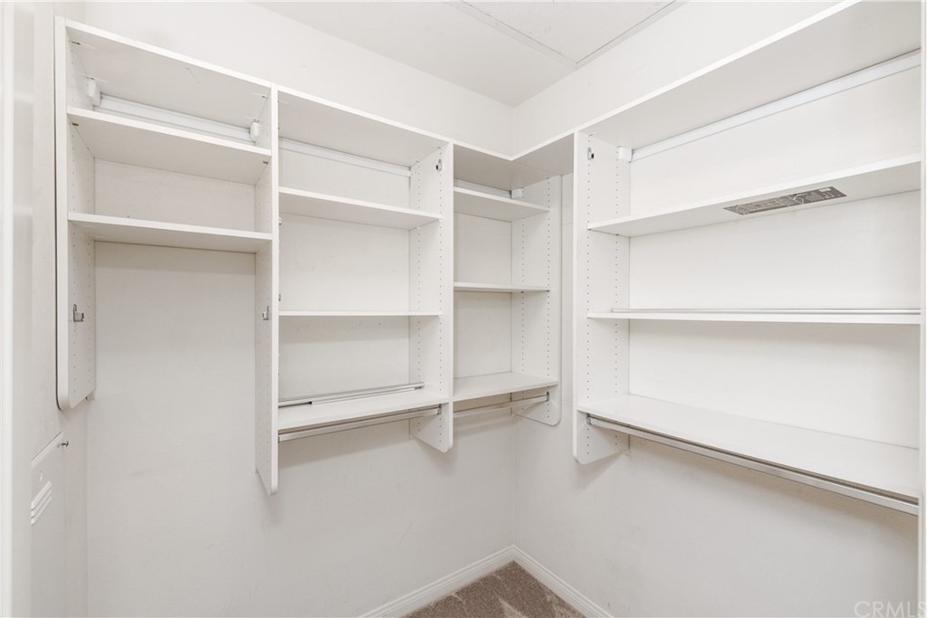97 Mayfair Irvine, CA 92620 - Photo 27 of 42 a view of an empty walk in closet