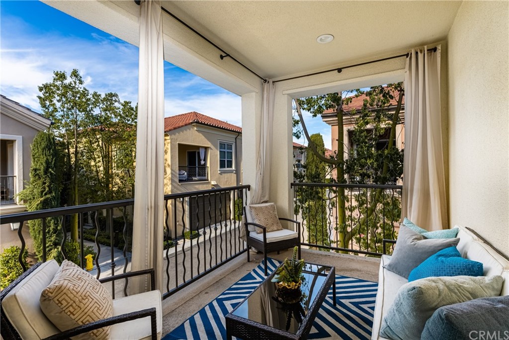 97 Mayfair Irvine, CA 92620 - Photo 3 of 42 a view of a livingroom with furniture and floor to ceiling window