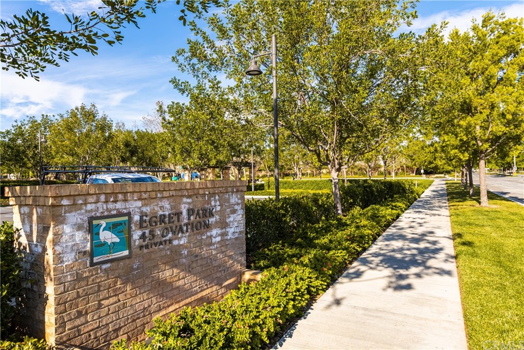 97 Mayfair Irvine, CA 92620 - Photo 32 of 42 a view of a pathway with a wrought fence