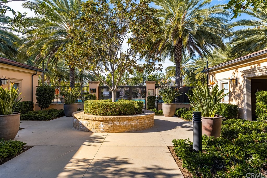 97 Mayfair Irvine, CA 92620 - Photo 33 of 42 a front view of a house with a garden and plants