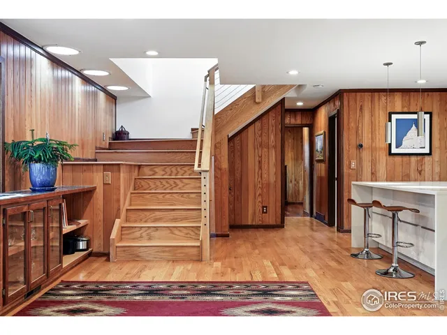 a view of room with furniture and entryway