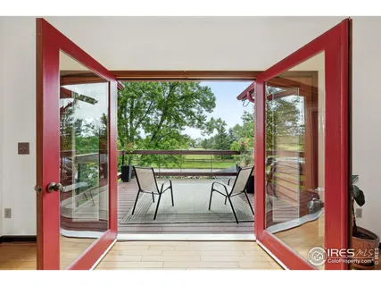 a view of a room with a porch and furniture