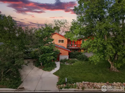 a house view with a garden space