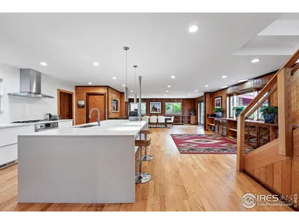 a view of kitchen with cabinets