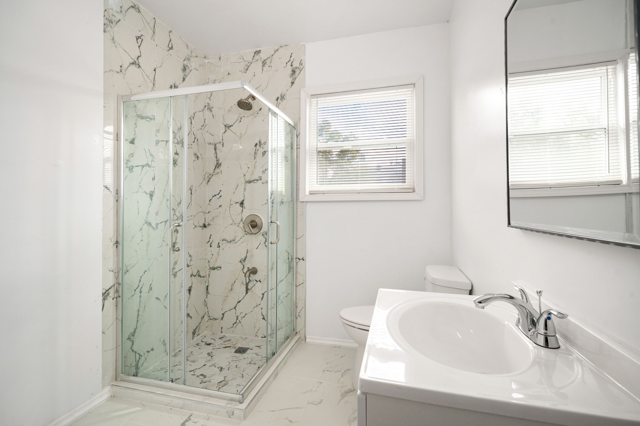 1202 Barkdull Street Houston, TX 77006 - Photo 31 of 48 a bathroom with a shower and a sink