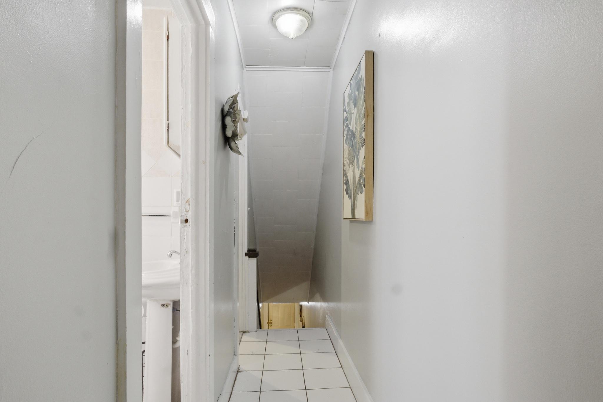 1330 Church Street Reading, PA 19601 - Photo 12 of 16 a bathroom with a shower and a mirror