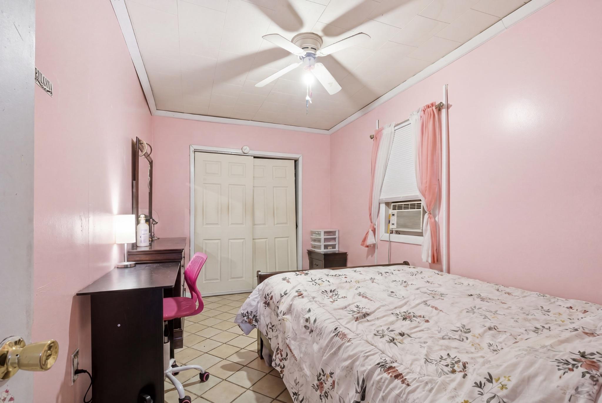 1330 Church Street Reading, PA 19601 - Photo 8 of 16 a bedroom with a bed dresser and a window