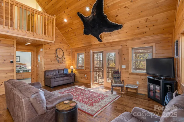 a view of balcony with wooden floor