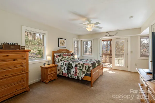 a view of a balcony with wooden floor