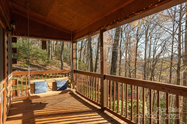 a bedroom with a bed and a television