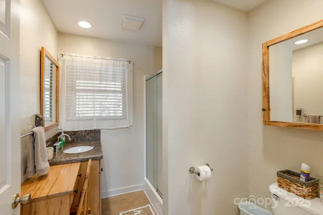 a bed room with a bed furniture and a window