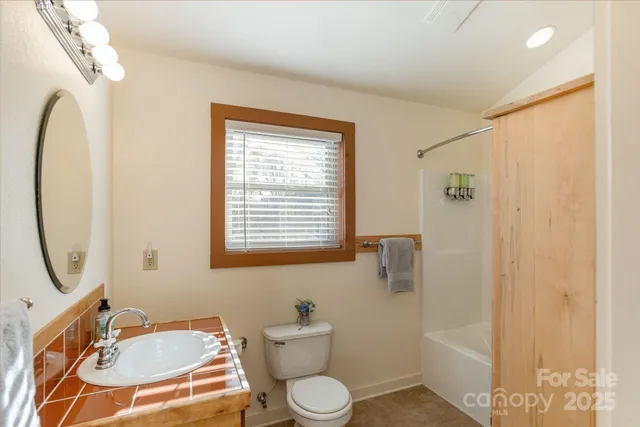 a view of balcony with furniture