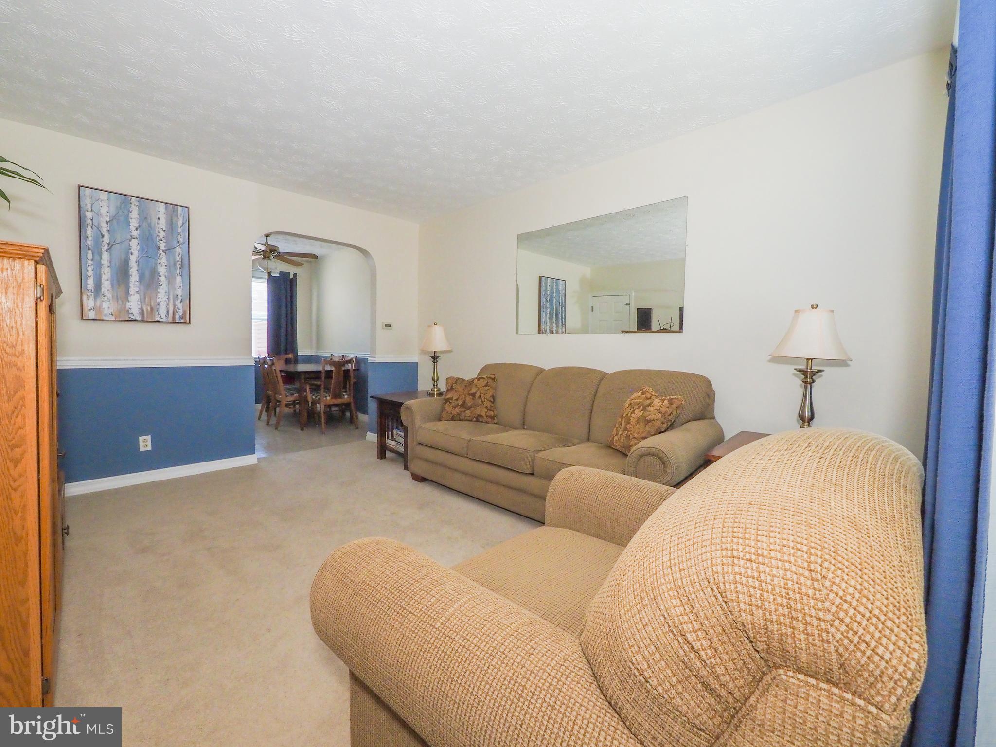 65 Wiltshire Road Baltimore, MD 21221 - Photo 3 of 26 Neutral decor in living room
