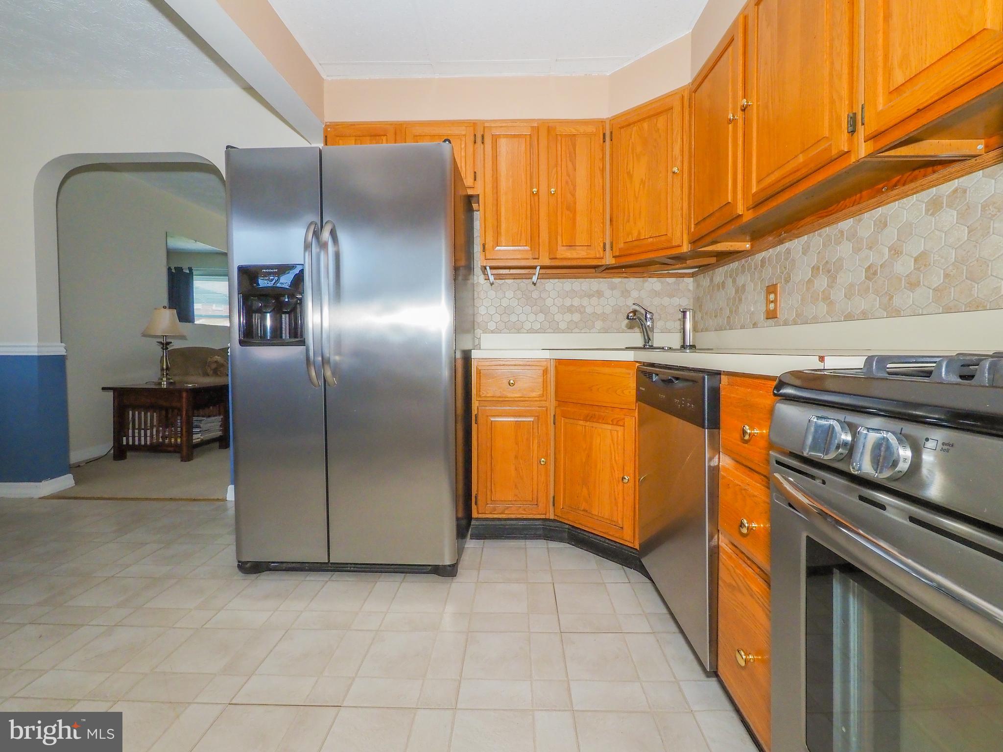 65 Wiltshire Road Baltimore, MD 21221 - Photo 8 of 26 Spacious kitchen dining area off living room
