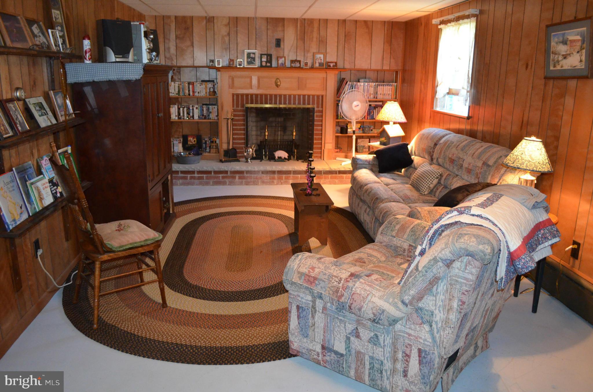 1406 Old Manchester Road Westminster, MD 21157 - Photo 21 of 29 Fabulous rec room with fireplace in lower level
