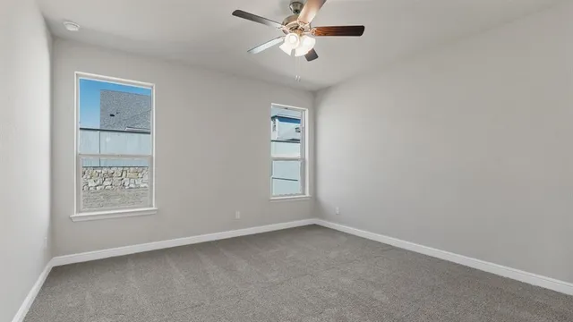 a view of kitchen with wooden floor and electronic appliances