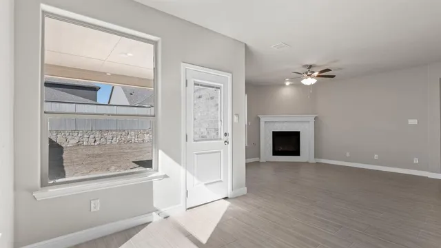 a kitchen with sink stove and refrigerator