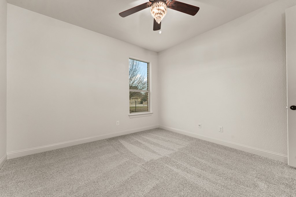 651 Shelf Rock Road Driftwood, TX 78619 - Photo 31 of 38 an empty room with a window