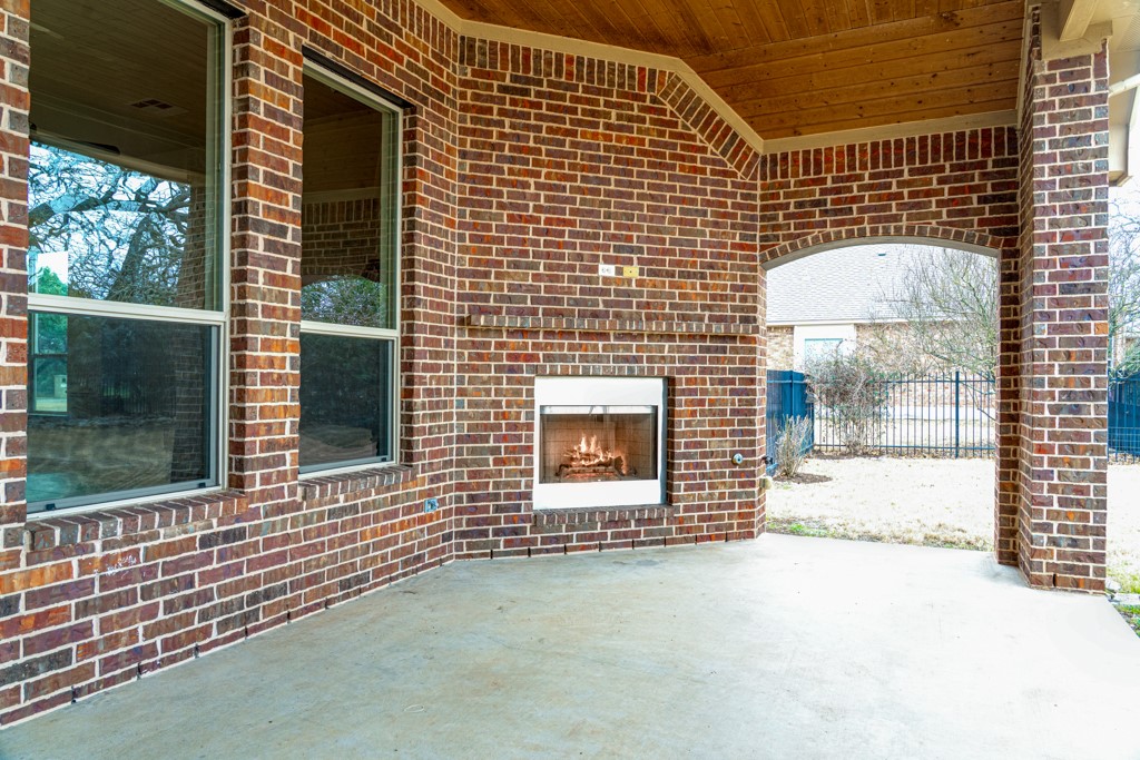 651 Shelf Rock Road Driftwood, TX 78619 - Photo 32 of 38 a front view of a house with a large window