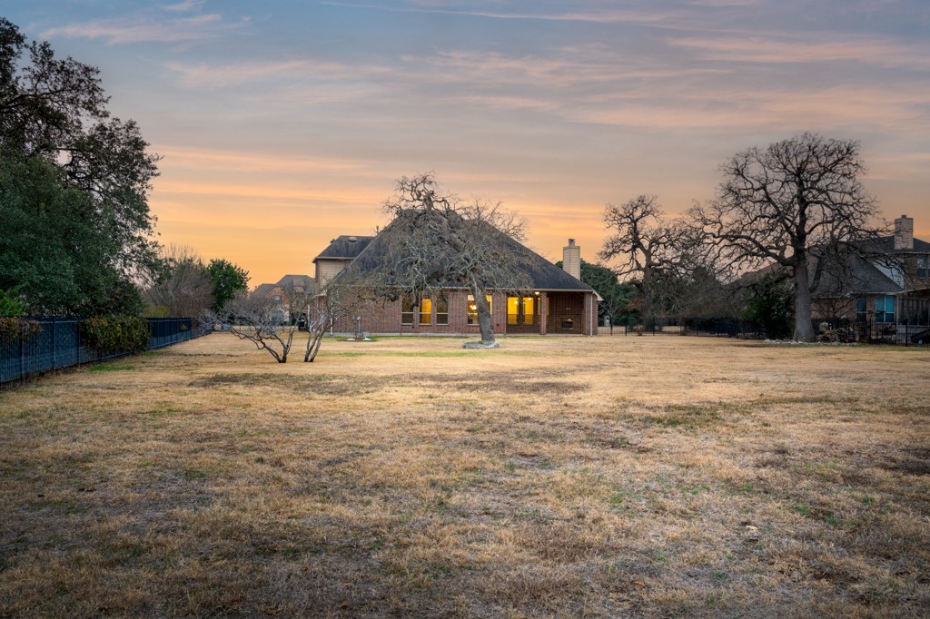 651 Shelf Rock Road Driftwood, TX 78619 - Photo 35 of 38 a view of back yard of the house