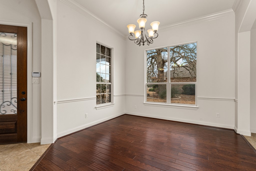 651 Shelf Rock Road Driftwood, TX 78619 - Photo 5 of 38 a view of livingroom with window and hardwood floor
