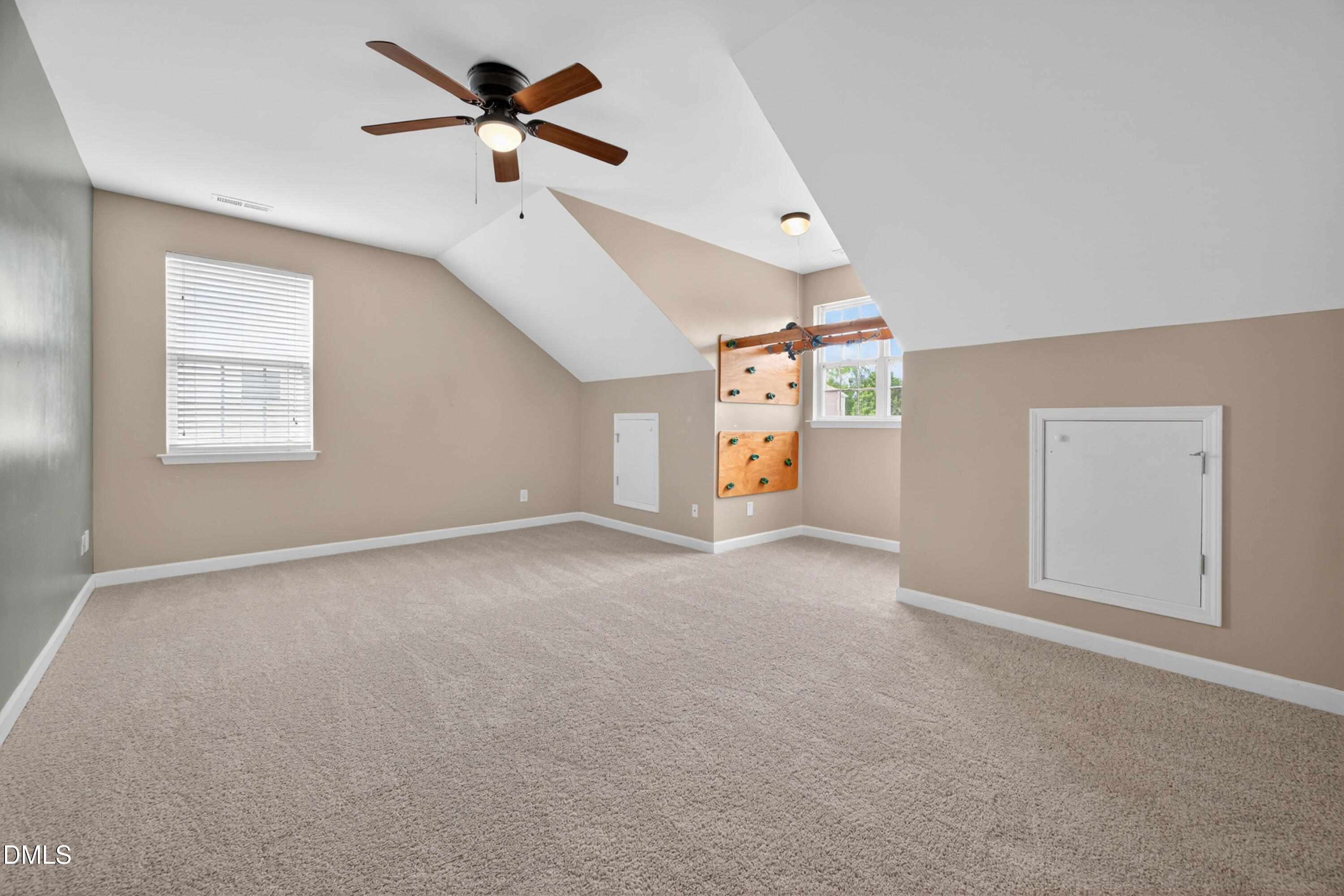 5304 Stone Station Drive Raleigh, NC 27616 - Photo 25 of 34 a view of a livingroom with a ceiling fan and window
