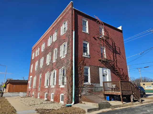 a front view of a building with street