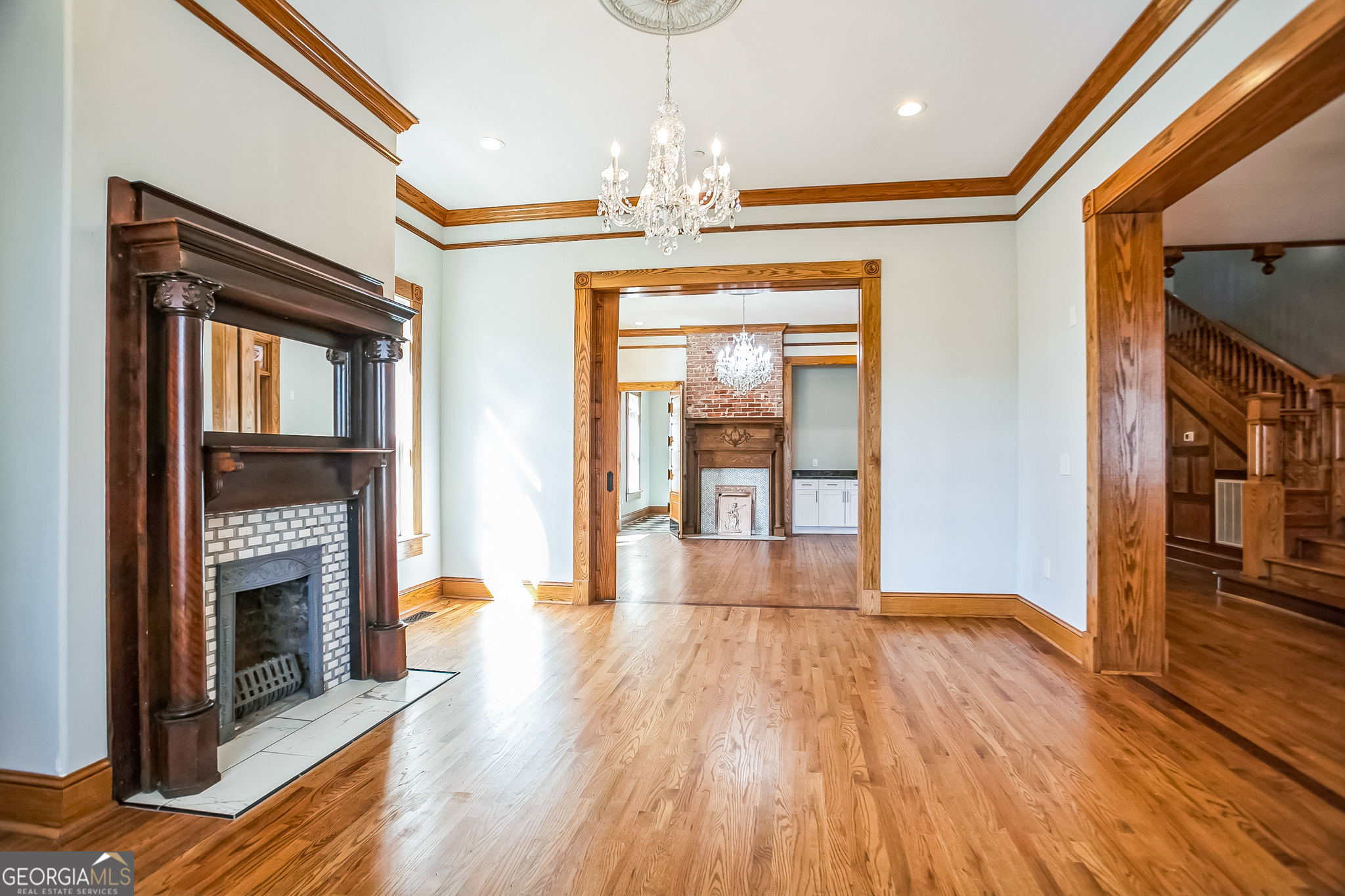 2 Coral Avenue Southwest Rome, GA 30161 - Photo 12 of 50 a view of a livingroom with wooden floor and a fireplace