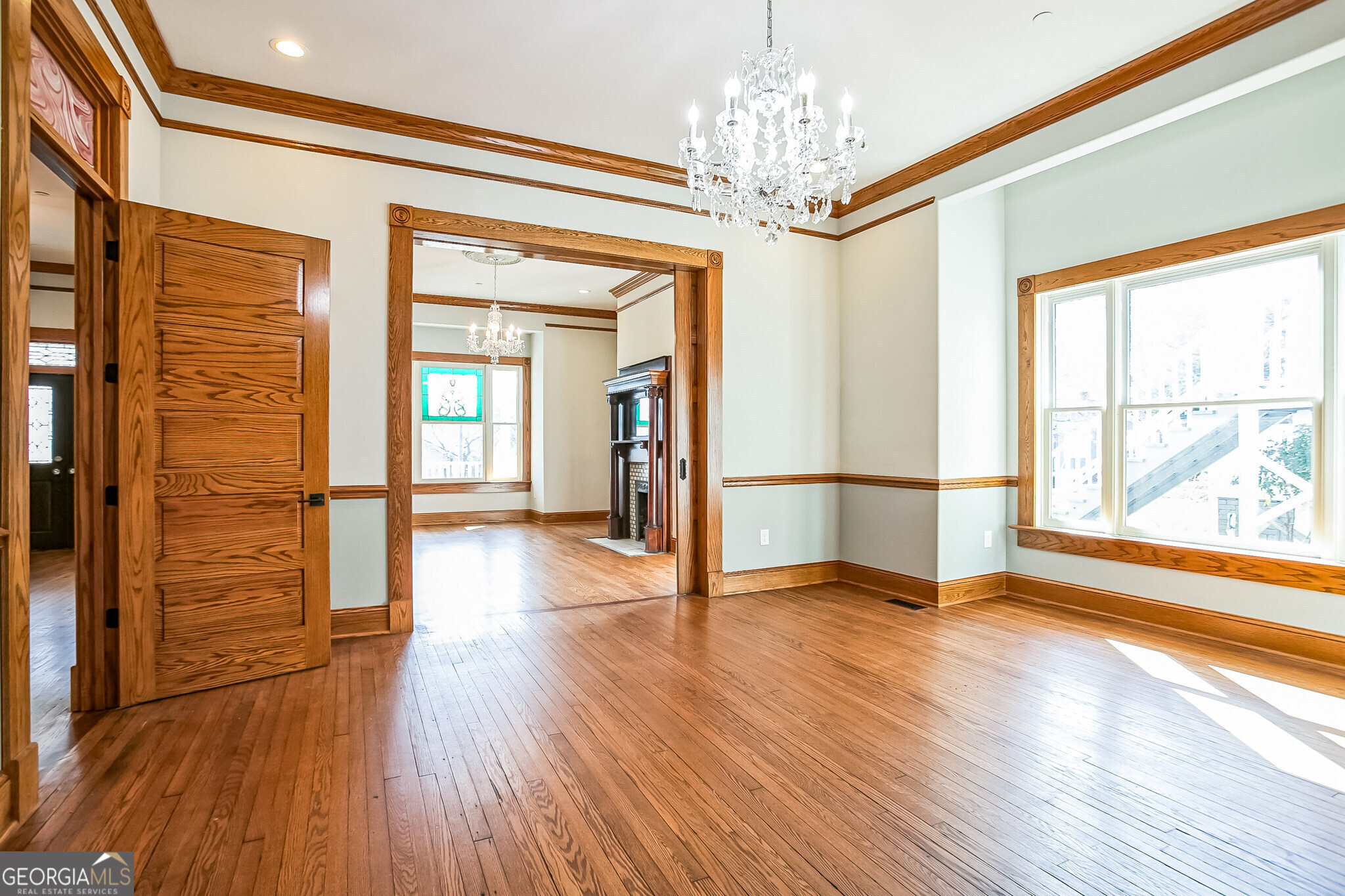2 Coral Avenue Southwest Rome, GA 30161 - Photo 13 of 50 a view of a big room with wooden floor chandelier and windows