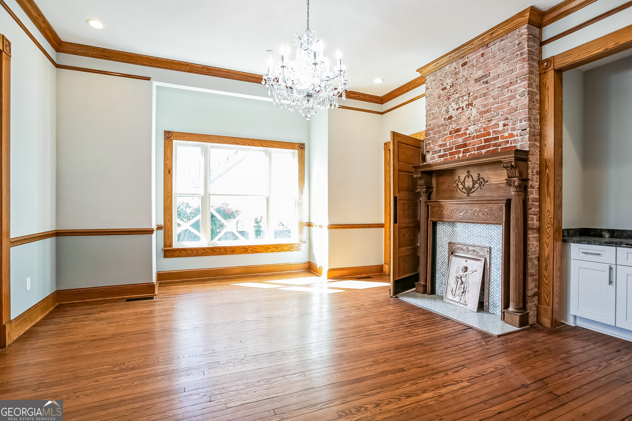 2 Coral Avenue Southwest Rome, GA 30161 - Photo 17 of 50 a view of an empty room with a window and wooden floor