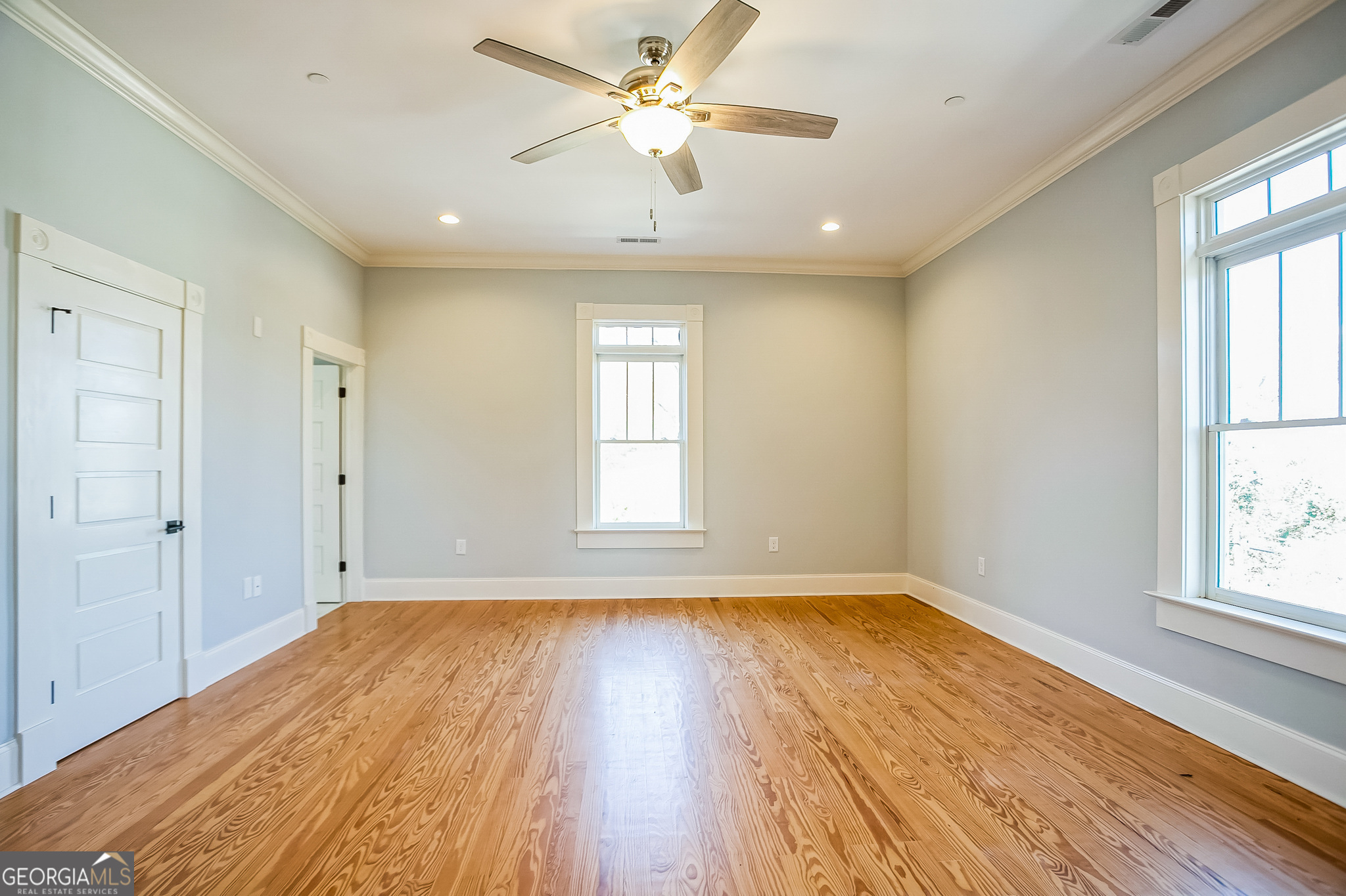 2 Coral Avenue Southwest Rome, GA 30161 - Photo 32 of 50 a view of empty room with wooden floor and fan
