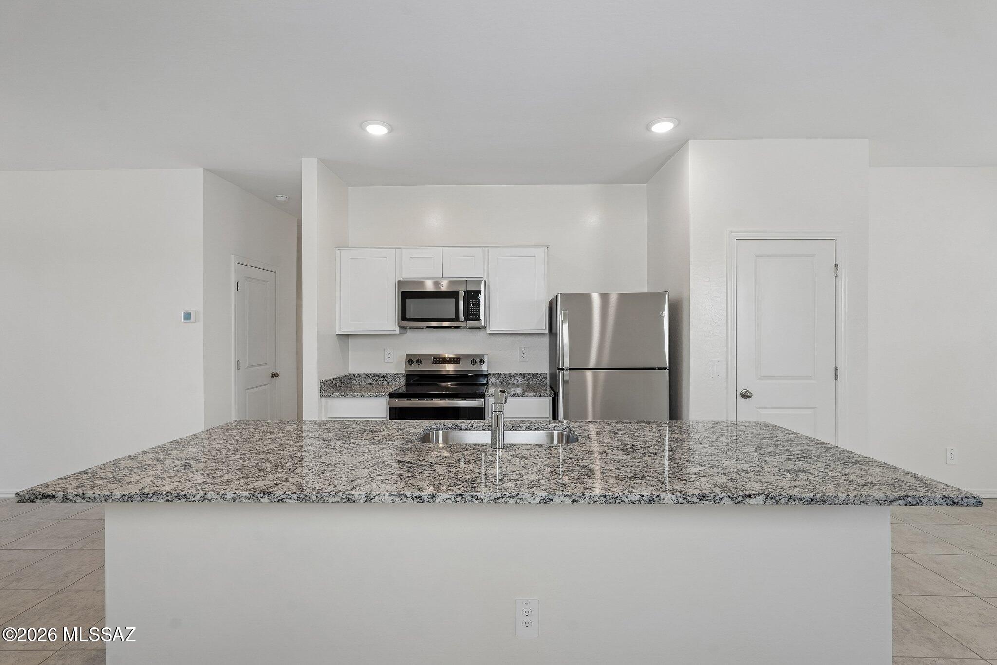 6735 West Star Wash Loop Tucson, AZ 85757 - Photo 15 of 16 SL_Sterling_Kitchen_B (4)