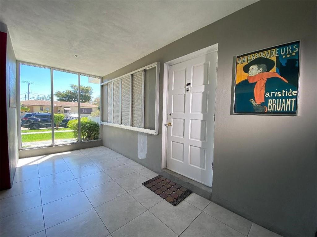1855 Plunkett Street, Unit 101 Hollywood, FL 33020 - Photo 4 of 25 a view of entryway