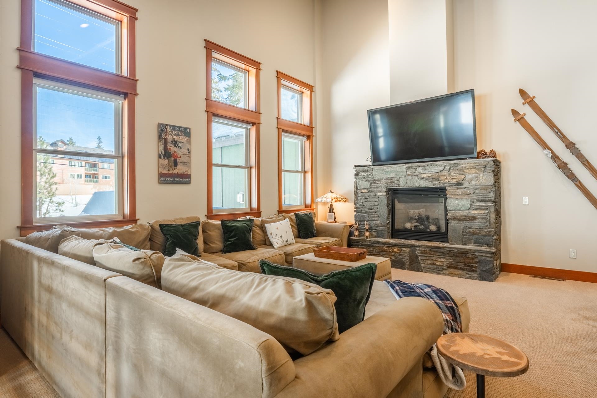 125 Davison Road, Unit 2 Mammoth Lakes, CA 93546 - Photo 15 of 50 a living room with furniture a flat screen tv and a fireplace