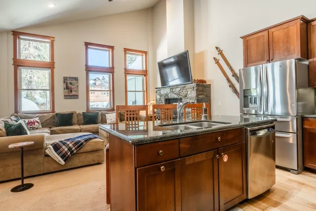 a view of living room with furniture and window