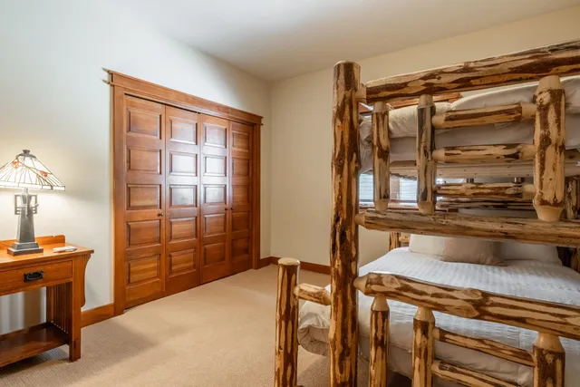 a kitchen with a refrigerator and a sink