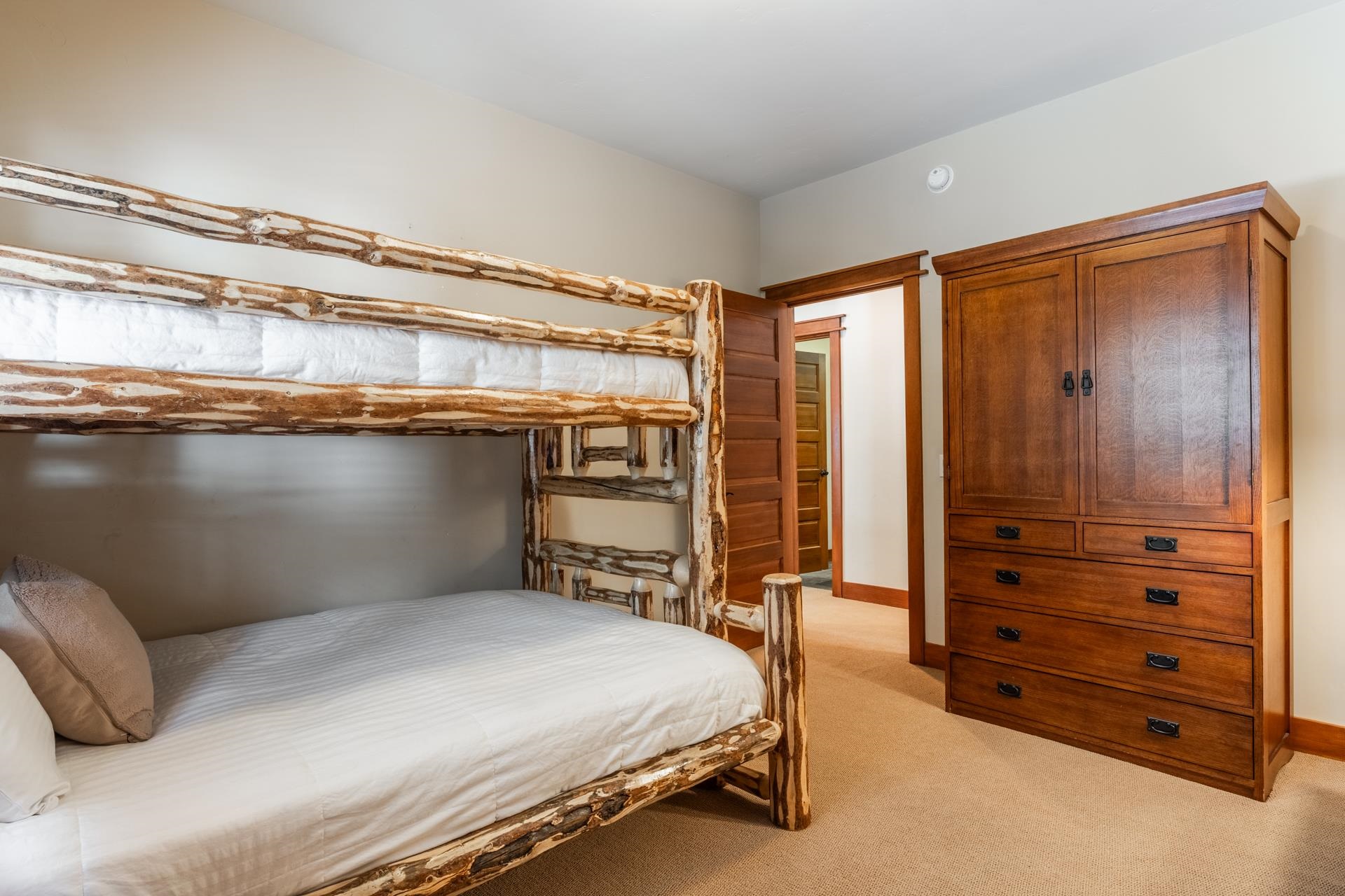 125 Davison Road, Unit 2 Mammoth Lakes, CA 93546 - Photo 29 of 50 a bedroom with a bed and a dresser